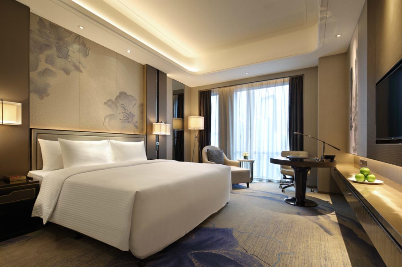 ว่านต้า เรล์ม หลิ่วโจว Hotel ภายนอก รูปภาพ